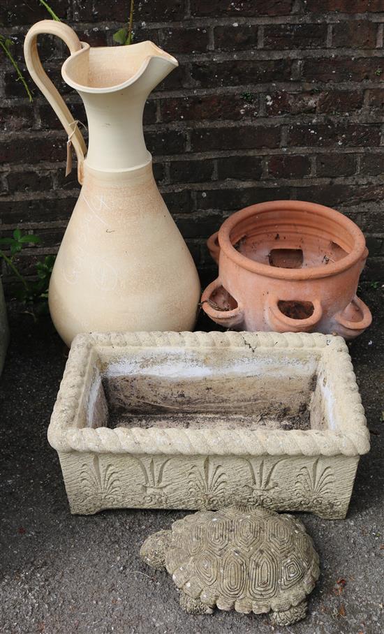 Large water jug, planter, tortoise and a plant pot